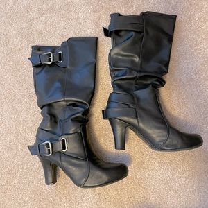 Tall black healed boots